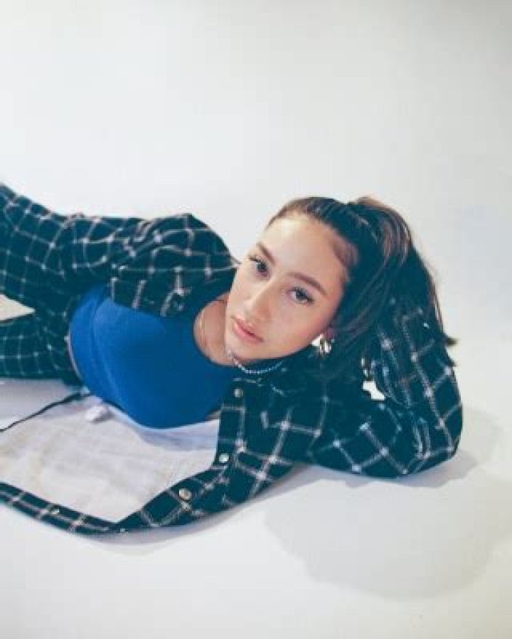 Singer-songwriter Alex Porat spills on her new single, "Girlfriend"